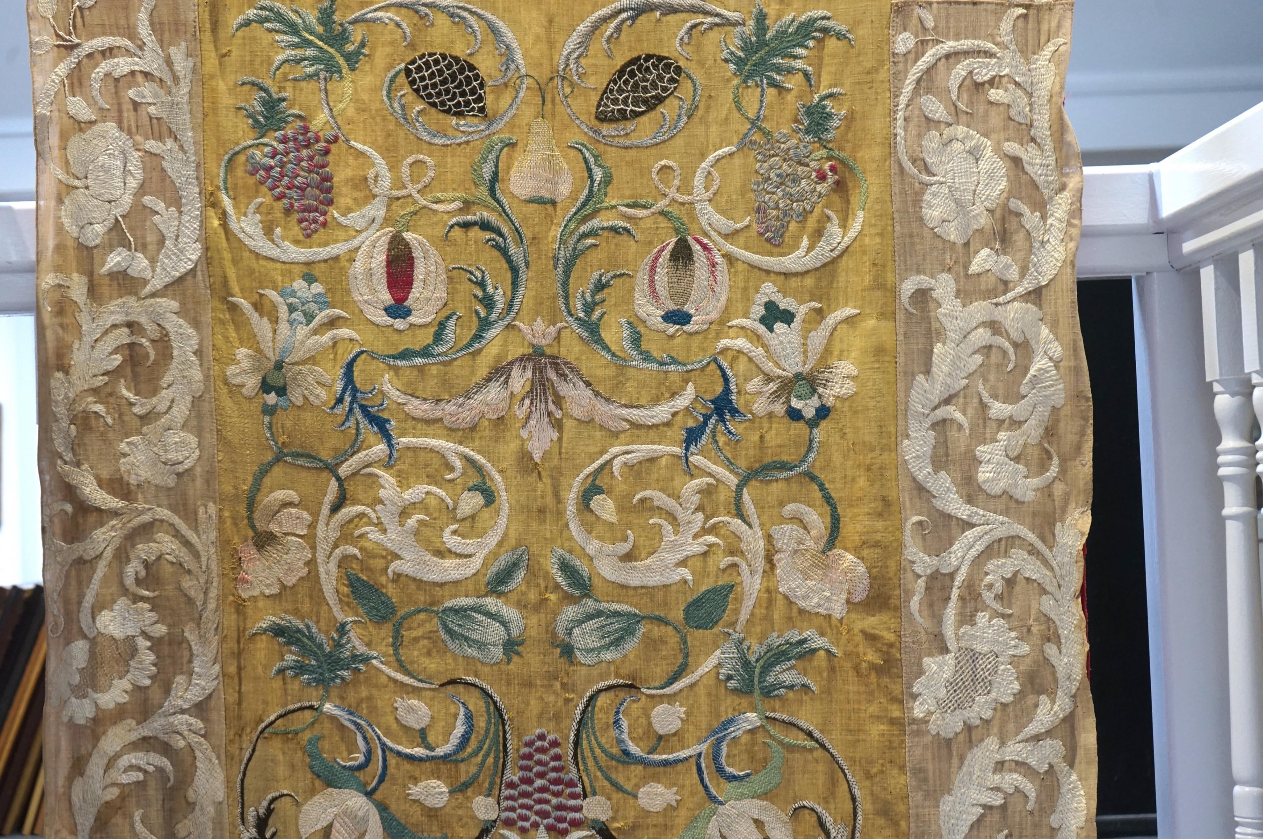 A large pair and one smaller panel of late 18th century Italian silk floss hand embroidered panels, possibly from Florence or Venice, both known for floss embroidery. Thought to be originally sacristy hangings. Elaborate